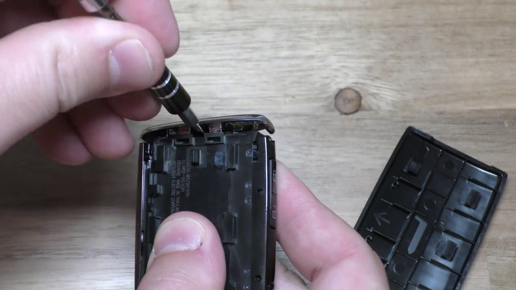 Prying back chrome piece from Mazda 2019 Key Fob